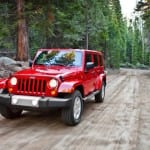 Red Jeep in Woods