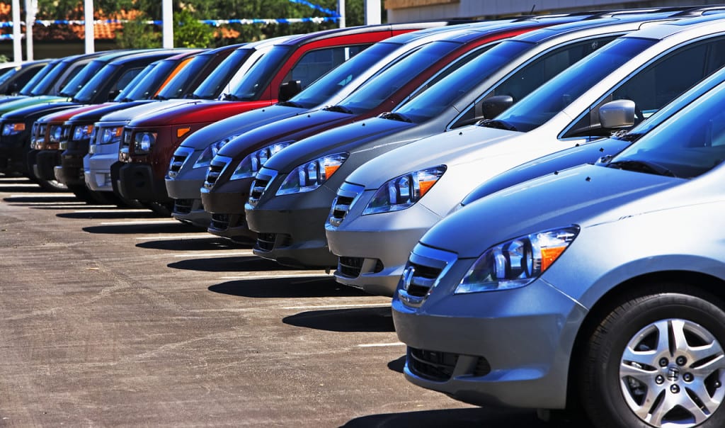 Row of new cars on lot