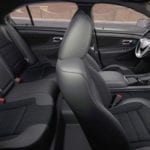 The interior of a 2018 Ford Taurus is shown from the passenger side.