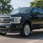 Black 2019 Ford F-150 driving by the ocean