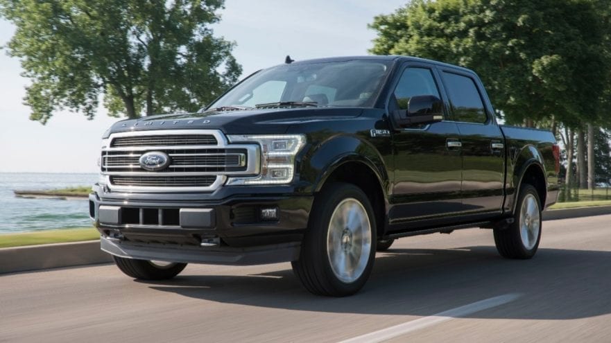 Black 2019 Ford F-150 driving by the ocean