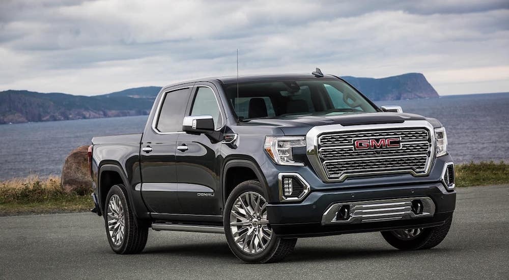 The 2019 GMC Sierra 1500 sits parked by a coastal highway