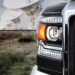 2018 GMC Sierra 2500HD closeup in front of satellites