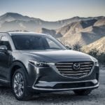 A gray 2019 Mazda CX-9 on a mountain top