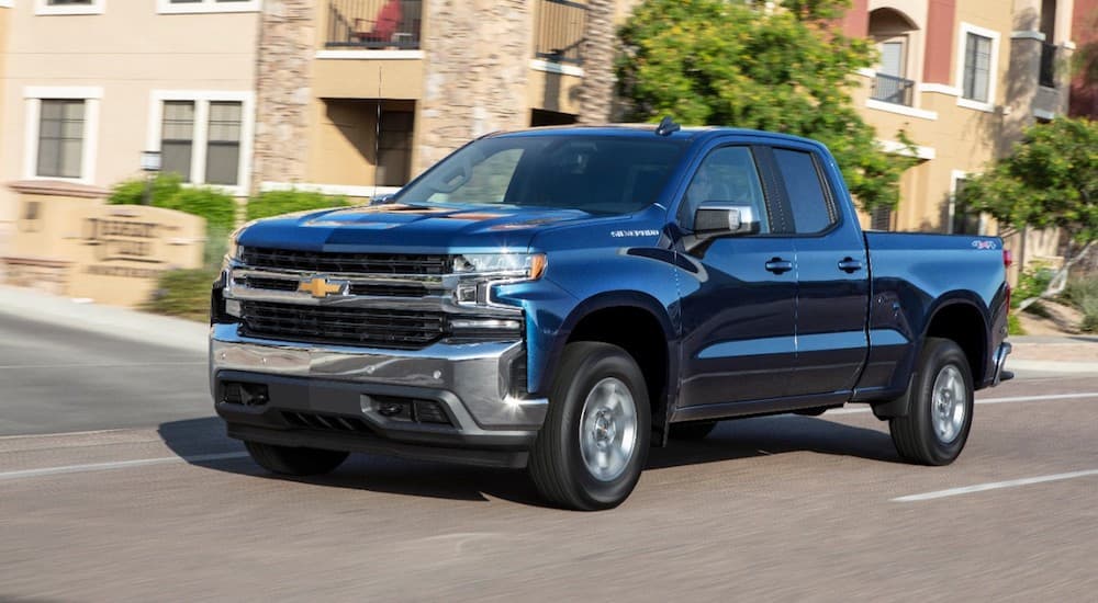 Dark blue 2019 Chevy Silverado Turbo on street