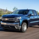 Dark blue 2019 Chevy Silverado Turbo on desert road