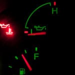 Warning lights on a Ford showing an Oil Change is needed