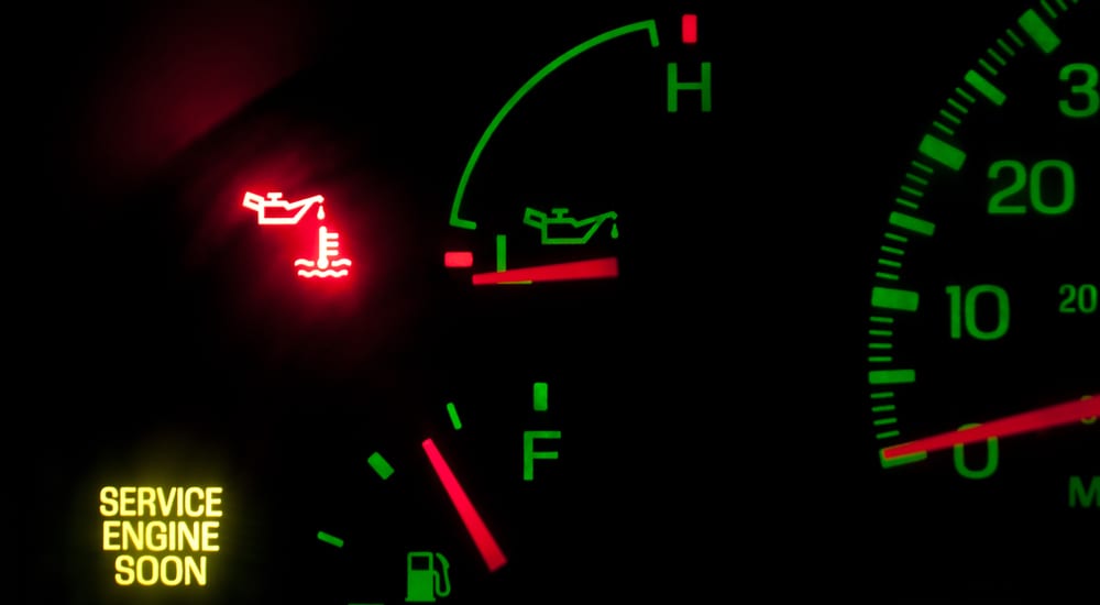 Warning lights on a Ford showing an Oil Change is needed