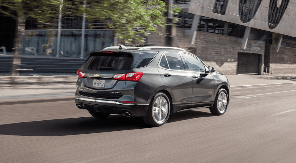 A gray 2019 Chevy Equinox driving