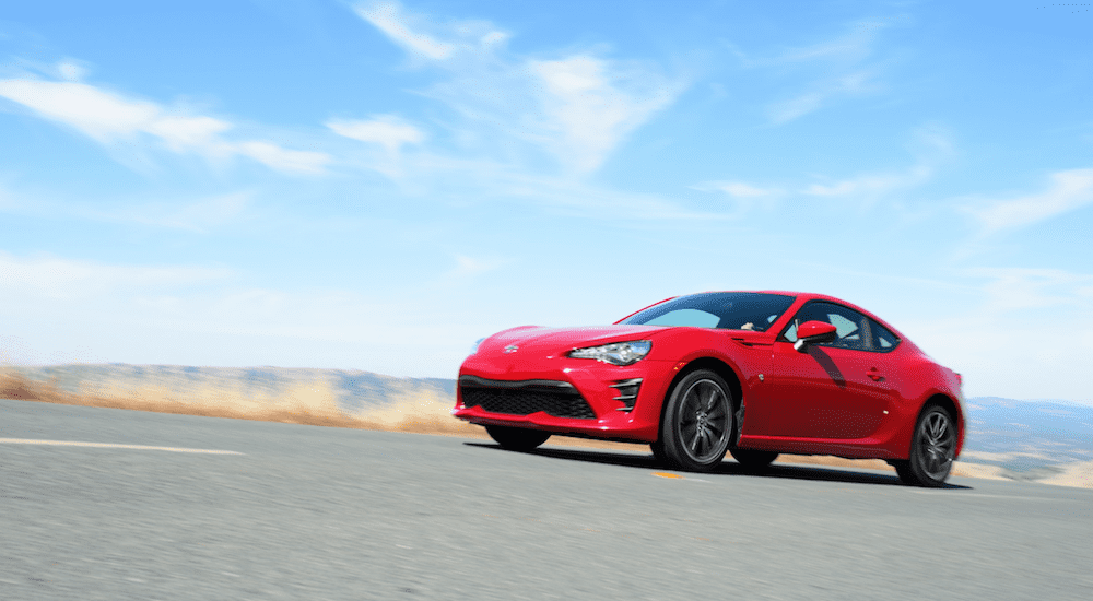 A red 2019 Toyota 86 on a road
