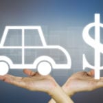 Car and dollar sign icons above crossed hands against a gray background. Finding the value of used cars with a vehicle history report