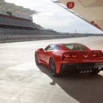 A red 2019 Chevy Corvette parked on a race track