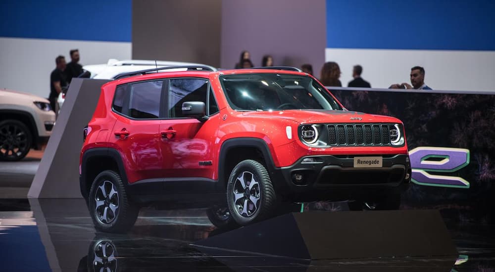 A red Jeep Renegade i son display at the 2019 Geneva Motor Show.