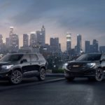 The Black Editions of the 2019 Acadia and Terrain are part of the GMC SUVs lineup. They are shown with a city skyline in the background.