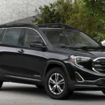 A black 2019 GMC Terrain SLE is parked.