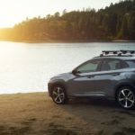 A silver 2019 Hyundai Kona is parked at a lake.