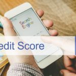 A phone is showing a search for 'credit score'.