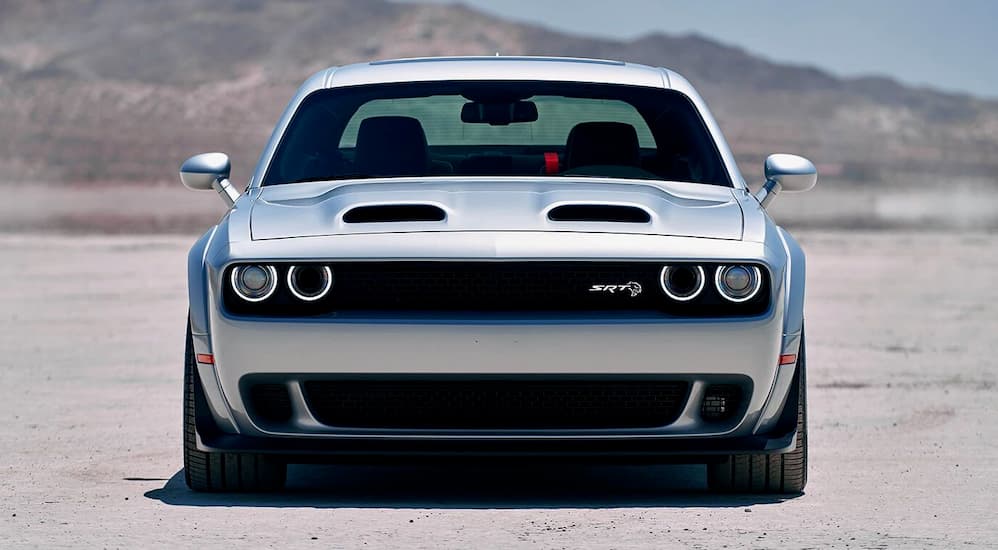 A silver 2019 Dodge Challenger SRT is in the desert.