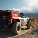 The Race Prototype of the 2020 Ford Bronco is shown from the rear in the desert.