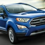 A blue 2020 Ford Ecosport, which wins when comparing the 2020 Ford EcoSport vs 2020 Honda HR-V, is driving on a highway.