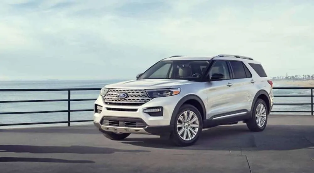 A white 2020 Ford Explorer is parked on a pier after winning the 2020 Ford Explorer vs 2020 Jeep Grand Cherokee comparison.