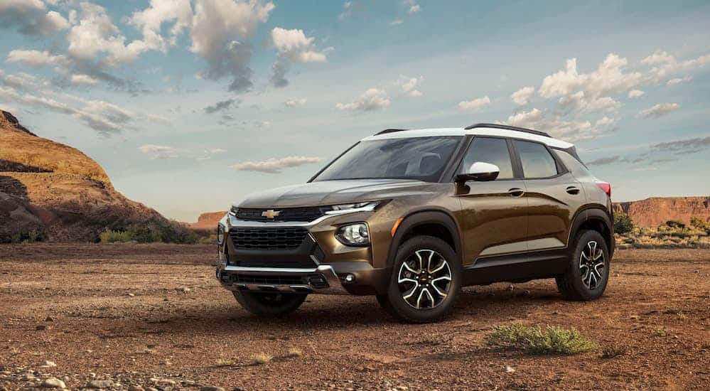 A brown 2021 Chevy Trailblazer, which is soon to be a favorite among Chevy SUVs, is parked in a desert.