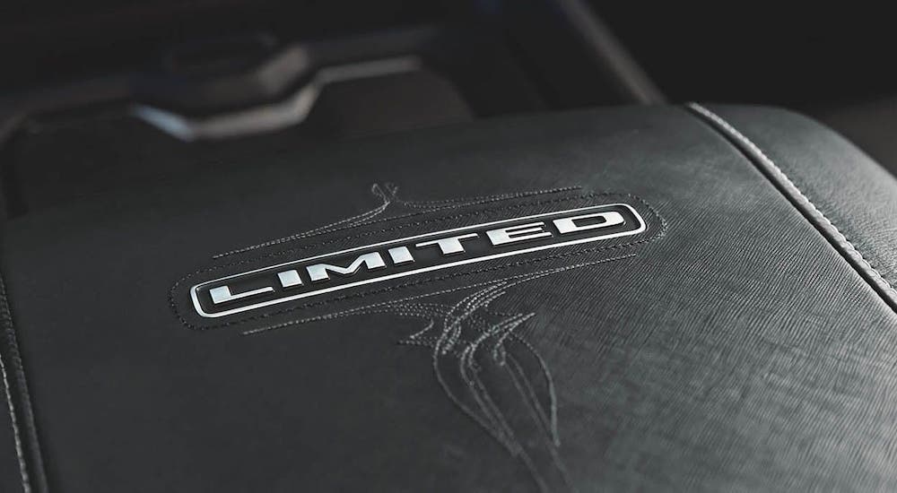 A closeup is shown of the 'Limited' stitching in a 2020 Ram 1500 Limited, find one at a Ram dealership near me.