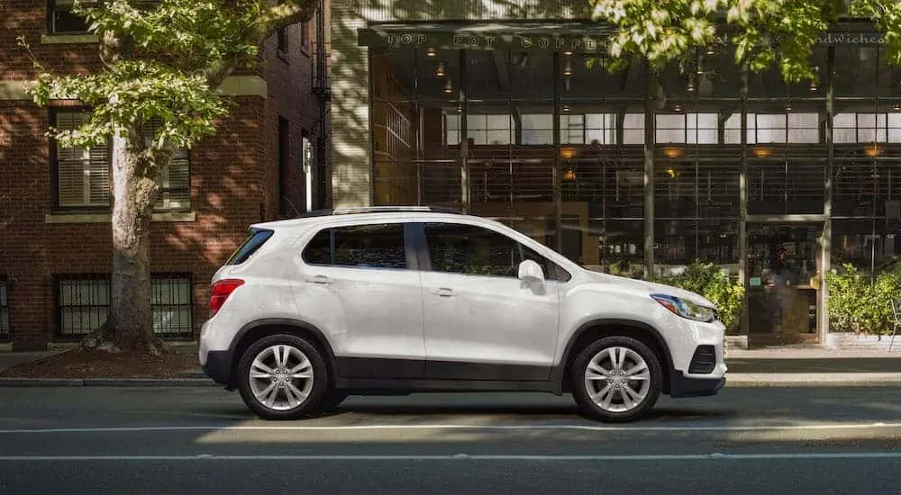 A white 2020 Chevy Trax is parked on a city street after winning the 2020 Chevy Trax vs 2020 Ford EcoSport comparison.