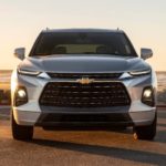 A silver 2020 Chevy Blazer is shown from the front at a beach at sunset.