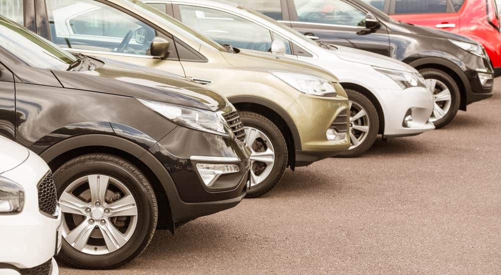 A row of used cars for sale near me is shown.