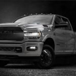 A silver 2020 Ram 3500 Night Package is parked on the pavement after leaving the Ram dealer.