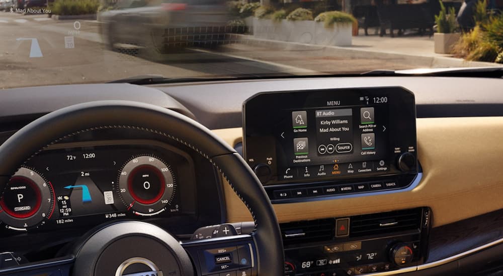 The infotainment screen is shown in a 2021 Nissan Rogue.