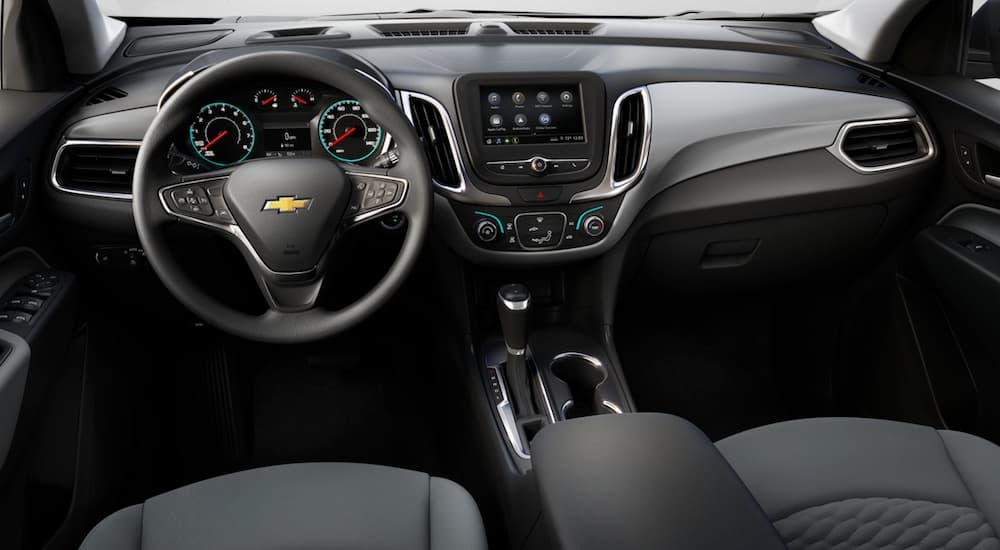 The black interior of a 2021 Chevy Equinox L is shown.