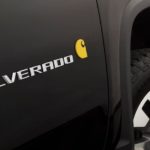 A closeup shows the badging on a black 2021 Chevy Silverado HD Carhartt edition, find one at your local Chevy diesel truck dealer.