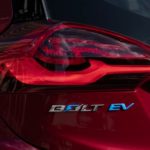 The badging on the back of red 2021 Chevy EV that says 'Bolt EV'.