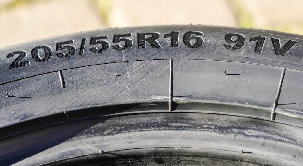 The code on the side of Cincinnati car tires is shown.