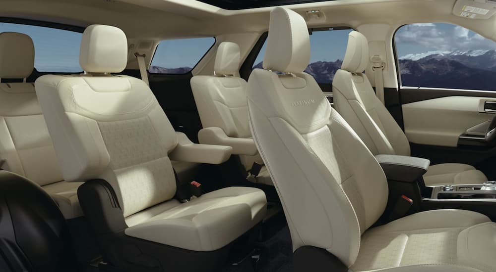 The white interior of a 2021 Ford Explorer is shown.