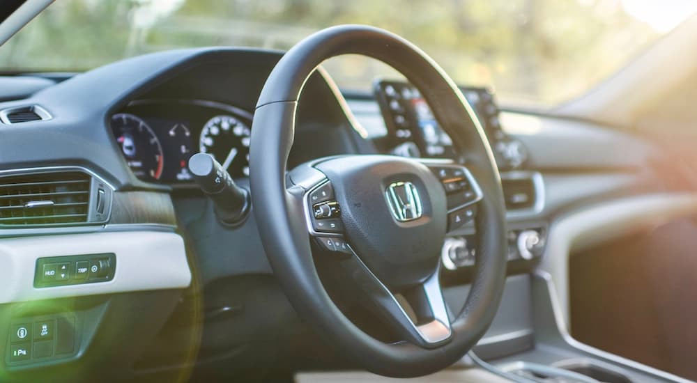 The steering wheel is shown in a 2021 Honda Accord.