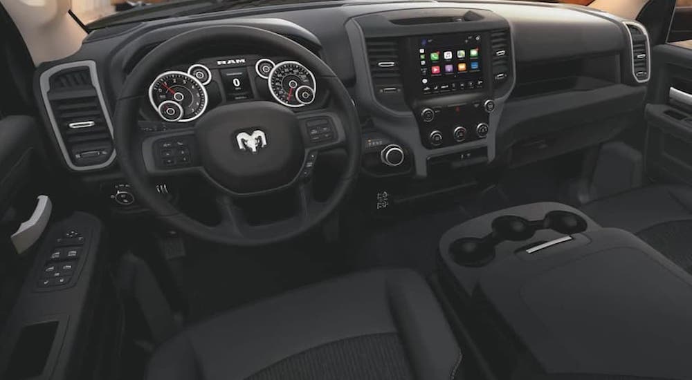 The black interior of a 2021 Ram 2500 is shown.