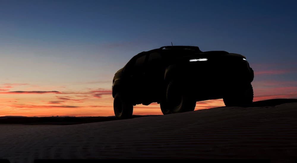 A silhouette of a 2016 Chevy Colorado ZH2 concept is shown at sunset.