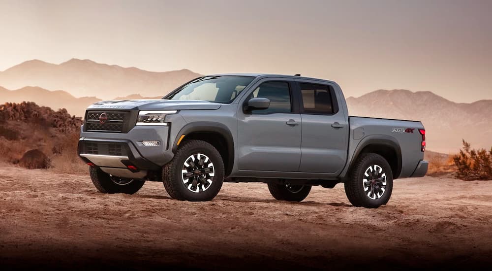 A gray 2022 Nissan Frontier is shown from the side after visiting an Indiana Nissan dealer.