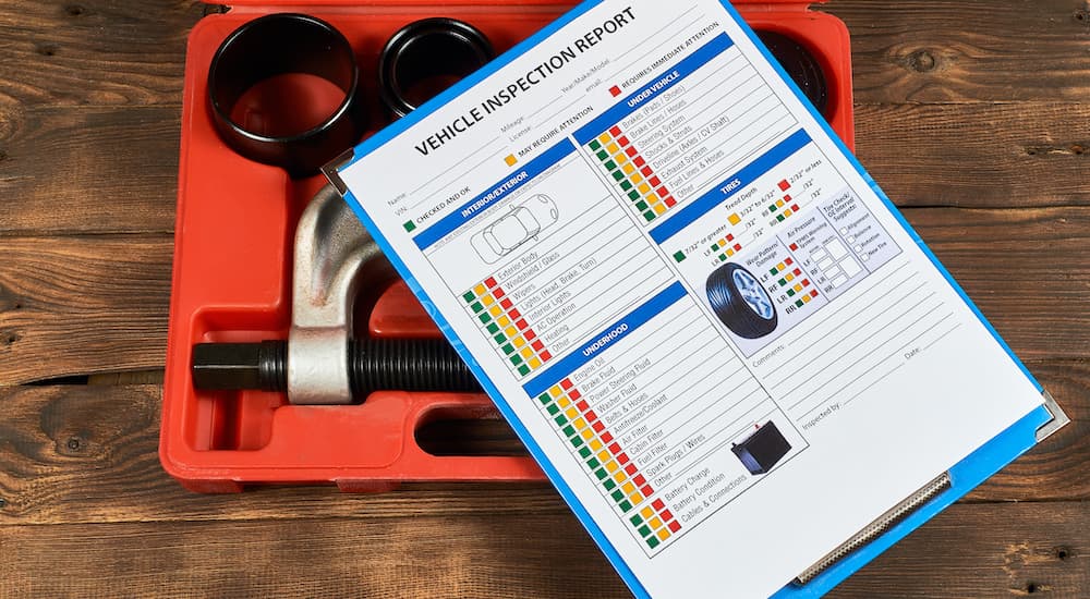 A close up shows shop inspection paperwork.