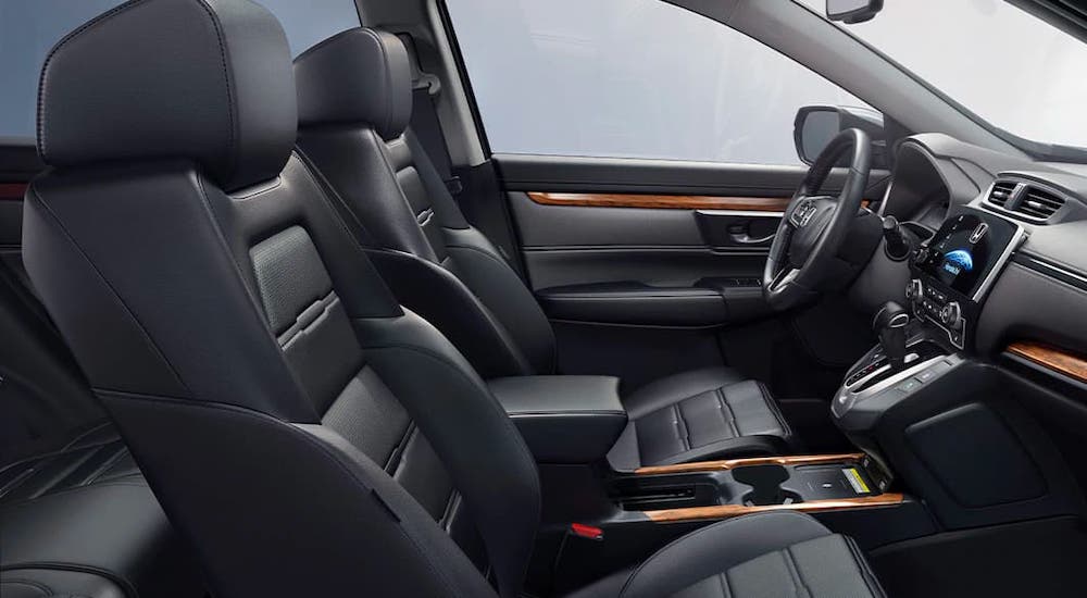 The front seats in a 2021 Honda CR-V are shown from the side.