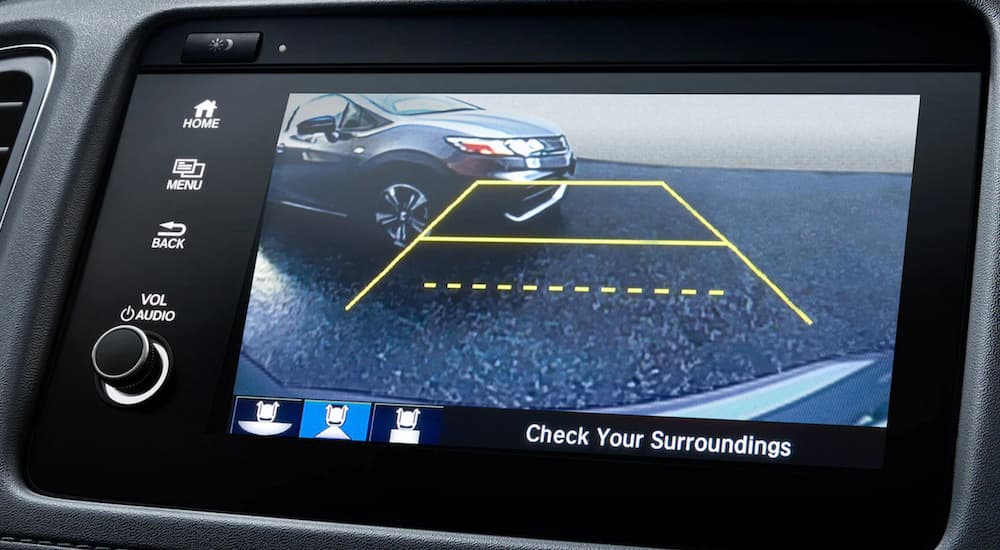 A close up shows the back up camera view on the infotainment screen of a 2021 Honda HR-V EX-L.