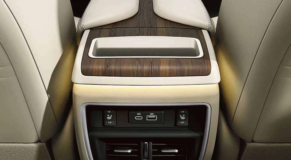 The tan and woodgrain interior is shown in a 2021 Nissan Murano.