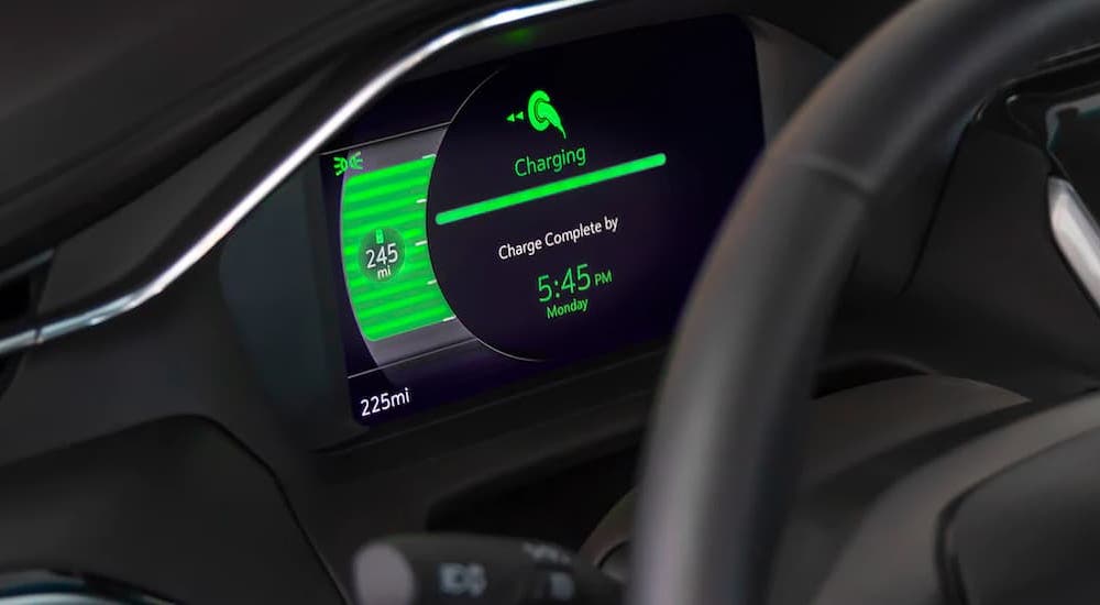 A close up shows the gauge cluster and charging status in a 2022 Chevy Bolt EUV.