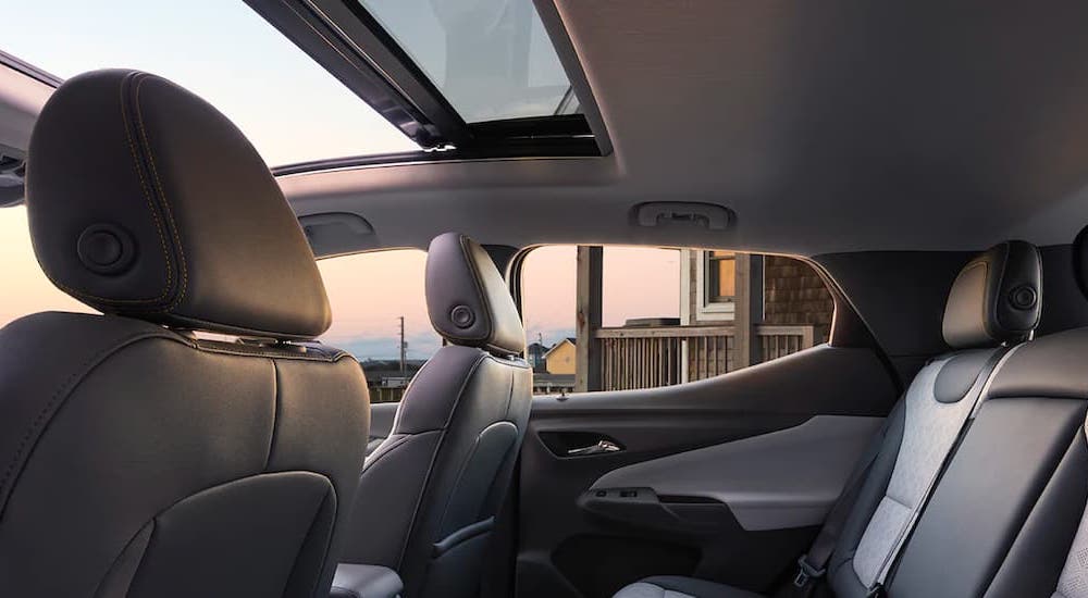 The black and silver interior and back seats are shown in a 2022 Chevy Bolt EUV.