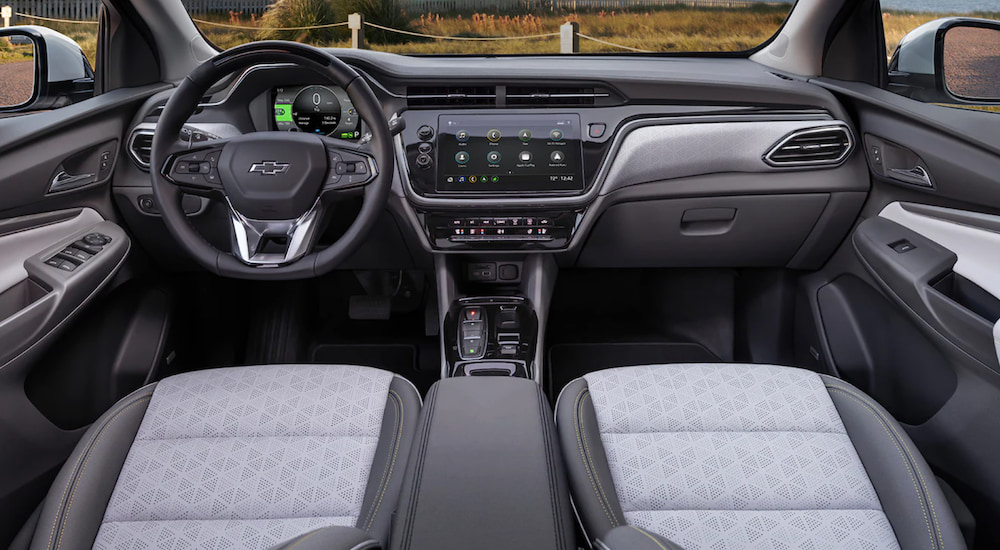 The steering wheel and infotainment screen are shown in a 2022 Chevy Bolt EUV.
