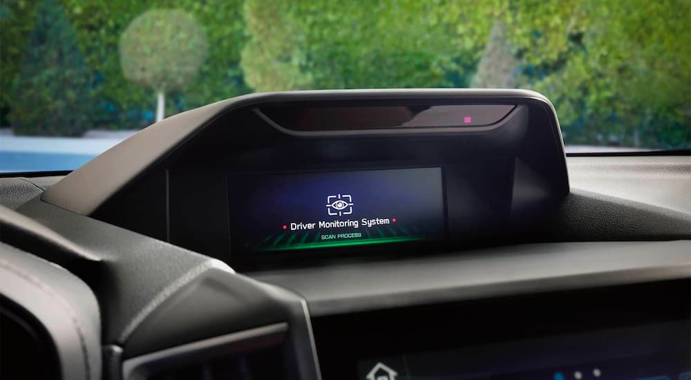 A close up shows the infotainment screen in a 2021 Subaru Forester with the EyeSight driver monitoring system.