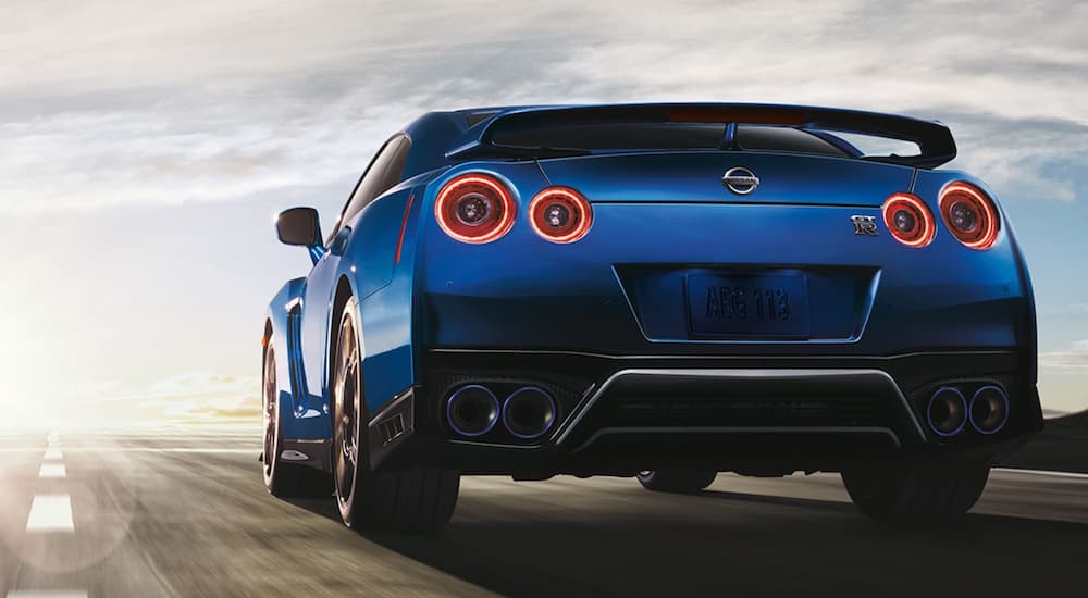 A blue 2021 Nissan GT-R NISMO is shown from the back.